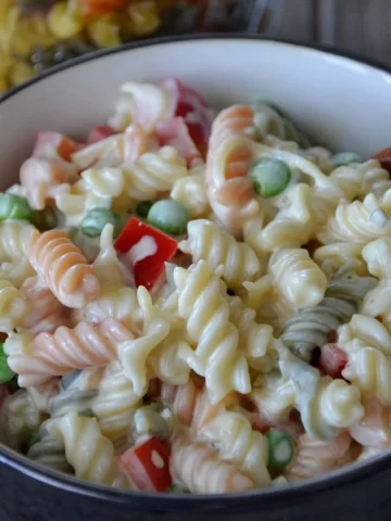 a detailed close up of finished macaroni salad.