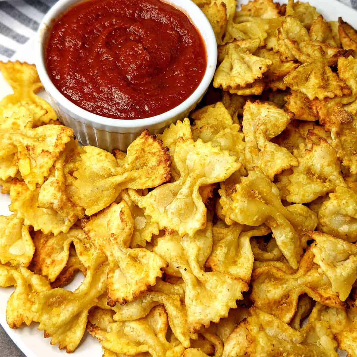 bowtie pasta turned into chips with marinara dip.