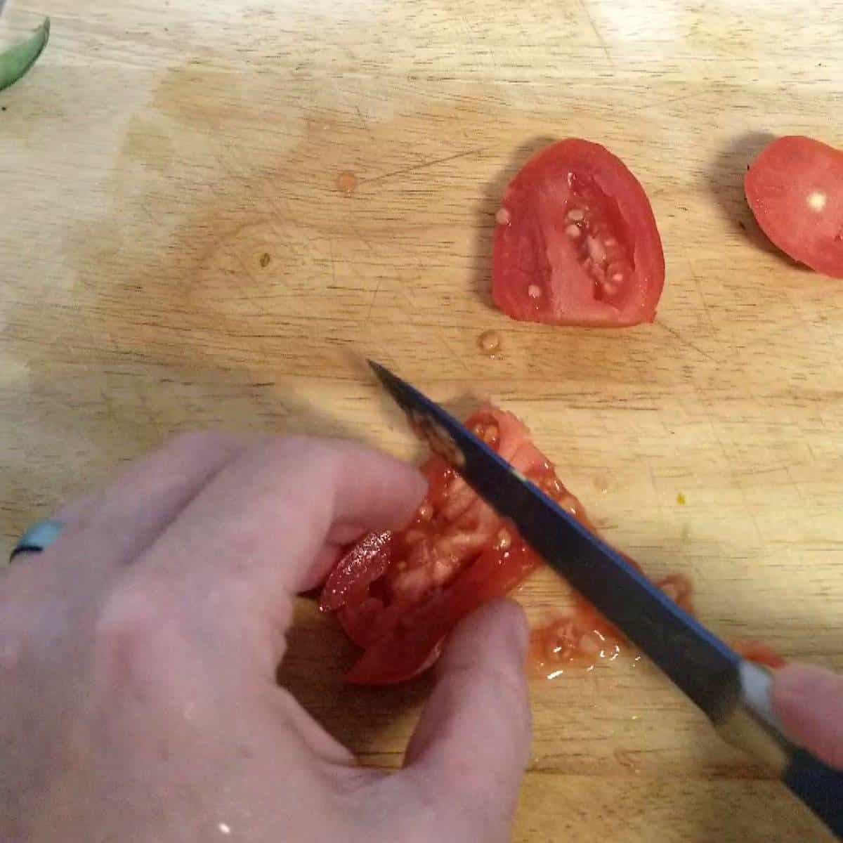 step three cutting tomato.