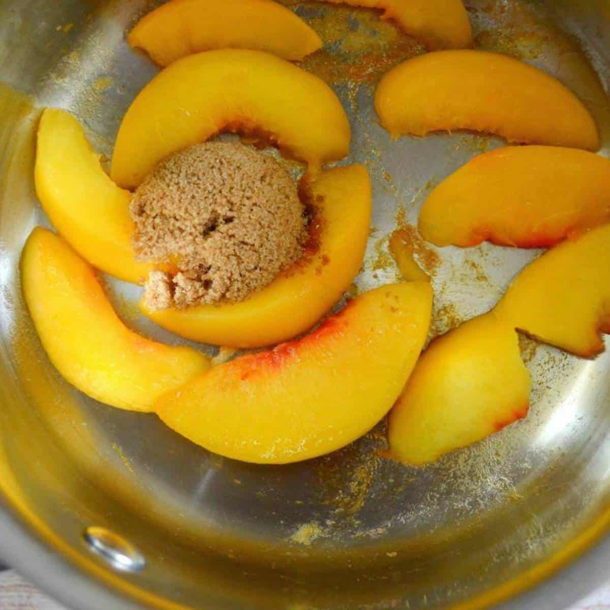 step three adding peaches and brown sugar to pan.