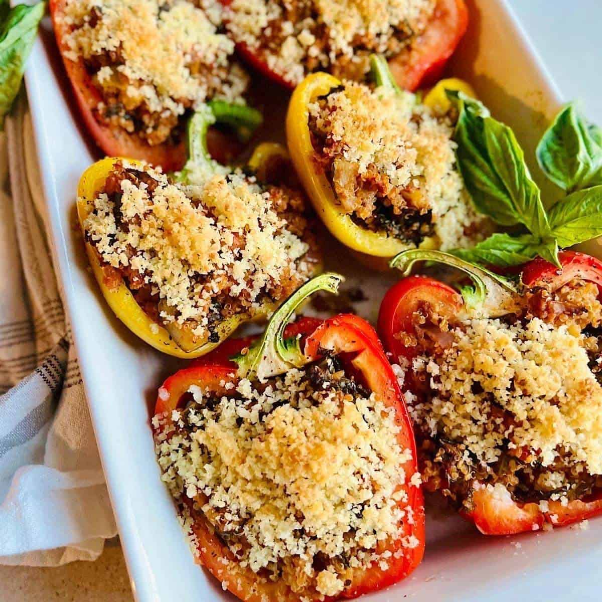 stuffed bell peppers in a baking dish.